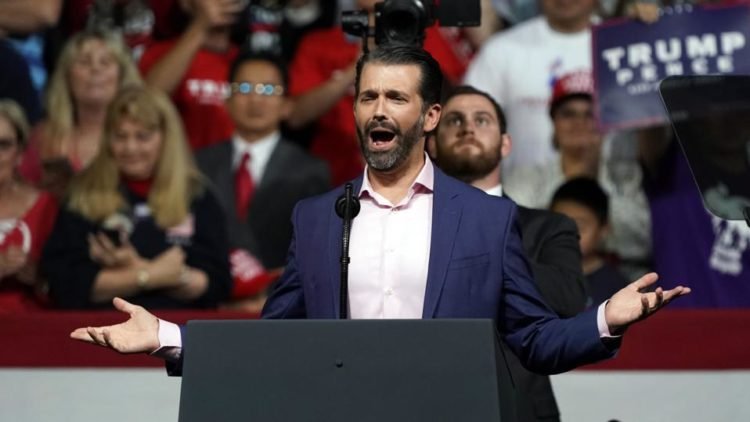 Donald Trump Jr suspended from tweeting after Covid-19 post