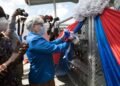 Ambassador Stephanie Sullivan cutting the ribbon for the Oxygen plant
